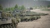 Leopard-2-Panzer der Bundeswehr bei einer Übung - die deutschen Streitkräfte sollen in den kommenden Jahren besser bewaffnet werden.
