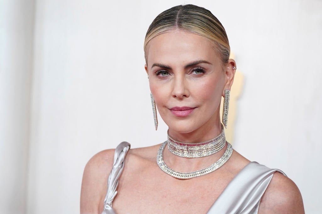 Charlize Theron sagt, sie sei sehr glücklich darüber, dass sie ihre Töchter ohne Partner an der Seite aufziehen kann. (Archivbild)