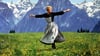 Die berühmte Szene aus „The Sound of Music“ („Meine Lieder, meine Träume“) mit Julie Andrews auf einer Alpenwiese.