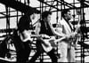 Nils Lofgren, Springsteen und Saxophonist Clarence Clemons bei ihrem legendären Auftritt in der DDR. 