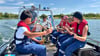 Beim Orientierungslauf am Sonnabend  werden die  Teams mit dem Prettiner Feuerwehrboot über den Badesee gefahren.