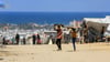 Menschen im Gazastreifen hoffen auf eine Waffenruhe.