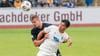 Florian Carstens (FC Hansa Rostock, li.) im Duell gegen Enis Bytyqi vom 1. FC Magdeburg II.