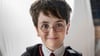 Dominic McLaughlin spielt Harry Potter.