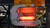 Stahlproduktion bei Thyssenkrupp-Steel: Hier wird flüssiger Stahl in große feste Blöcke, sogenannte Brammen, gewandelt.