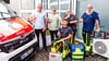 Geschäftsführer Claus Günther (von links), sein Stellvertreter David Kuhne, Luca Cappula, Kevin Lieder und Rettungsdienstleiter Andreas Lauenroth vor dem neuen Firmenzentrum in Wanzleben.