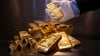 Übt nicht nur in physischer Form eine Faszination auf Anlegerinnen und Anleger aus: Gold.