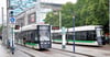 Die ersten beiden neuen Straßenbahnen der MVB treffen einander an der Haltestelle Alter Markt. 