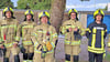 Die Mitglieder der Feuerwehr Wolmirstedt nehmen an der Baumpflanz-Challenge teil.