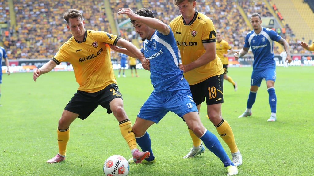 Gegen Dynamo Dresden feierte Eldin Dzogovic, hier im Duell mit gleich zwei Gegnern, sein Zweitliga-Comeback nach zwei Jahren.
