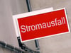 Ein Schild weist auf einen Stromausfall hin.