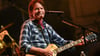 Der 80 Jahre alte Musiker John Fogerty will auch in Zukunft weiter regelmäßig auf der Bühne stehen. (Archivbild)