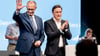 Gefeierter Kanzler und gestärkter Landeschef: Friedrich Merz (l) und Sebastian Lechner in Osnabrück.