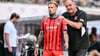 Trainer Frank Schmidt (r.) war mit seinem Team gegen Wolfsburg alles andere als zufrieden.