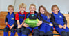Diese Jungs und Mädels um Matteo (Mitte) von der Kinderfeuerwehr Wiepke freuten sich über eine leckere Melone.  