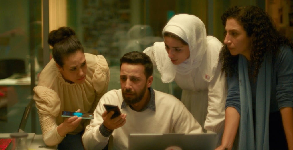 Szene aus dem Film - die Schauspieler verkörpern Hilfskräfte des Roten Halbmonds.