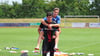 Ersatztorwart mit besonderer rolle beim 1. FC Magdeburg: Robert Kampa ist ein hilfsbereiter Mensch und trägt hier Albert Millgramm vom U-23-Team.
