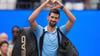 Mit einem Lächeln und einem mit den Händen geformten Herz verabschiedet sich Novak Djokovic vom New Yorker Publikum.