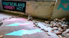 „Deutschland mordet mit“ steht in einer Arbeit von Luke Carter auf dem Streetart-Festival Ibug in Chemnitz. Das Ibug-Festival hat in diesem Jahr laut Veranstaltern einen neuen Besucherrekord erreicht. (Archivbild)
