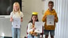 Neben Lesekönigin Lola Sue Kolm (Mitte) haben Alina Pausder den zweiten Platz und Sascha Meyer den dritten Platz errungen.