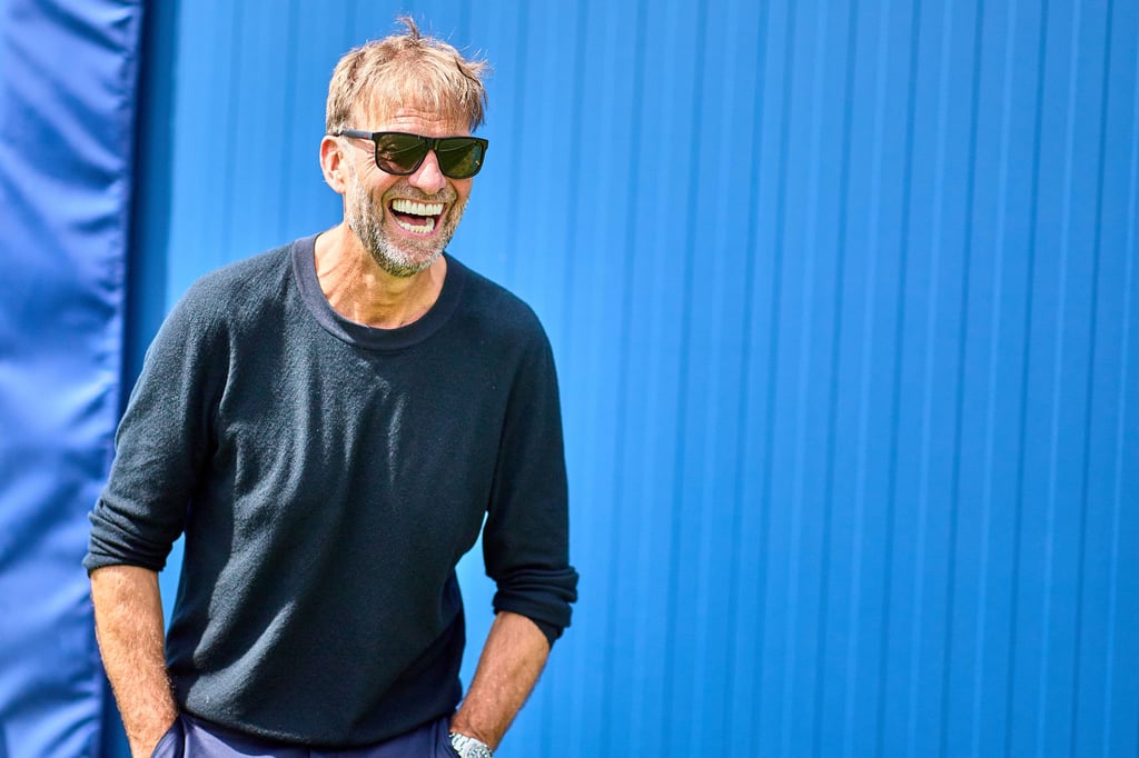 Jürgen Klopp mit einem jungen Fan.