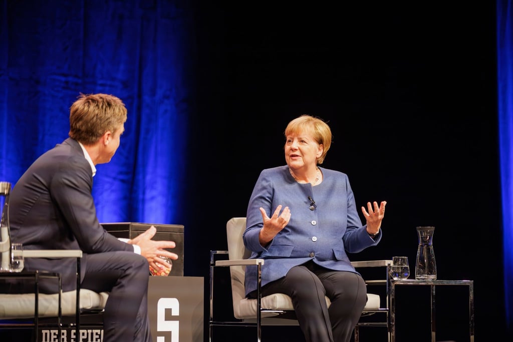So viel Lob für Merz hatte Merkel schon lange nicht mehr übrig.