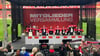 Das Podium bei der Mitgliederversammlung des 1. FC Köln.