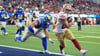 Christian McCaffrey (r) feierte mit den San Francisco 49ers einen überraschenden Sieg in Los Angeles.