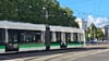 Eine der neuen Flexity-Straßenbahnen der MVB fährt im Magdeburger Stadtzentrum auf der Ernst-Reuter-Allee in Richtung Hauptbahnhof.