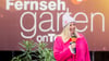Andrea Kiewel nimmt es mit Humor: Die Moderatorin vertauschte im "ZDF-Fernsehgarten" zwei Bundesländer.