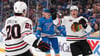 Lukas Reichel (r) erzielte erstmals zwei Tore in einem NHL-Spiel.