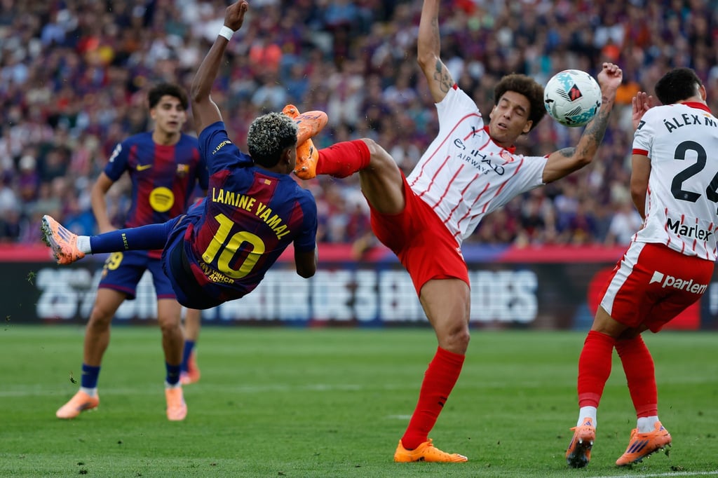 Barcelona mit Lamine Yamal (l) siegte gegen Girona mit dem früheren Dortmunder Axel Witsel.