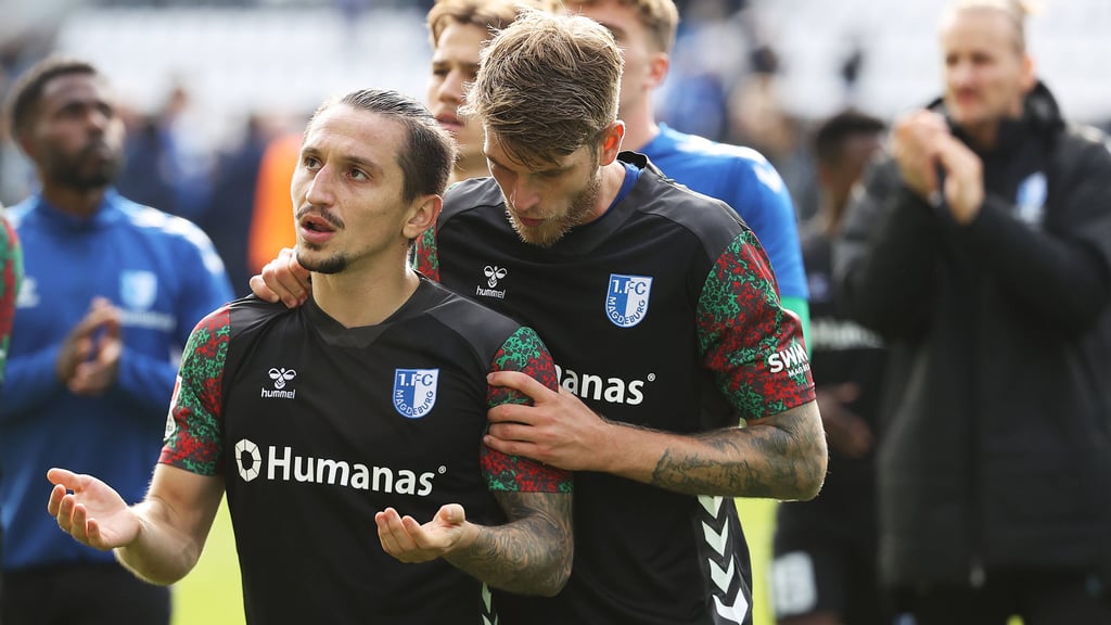 Baris Atik und Marcus Mathisen nach dem 0:0 zwischen dem 1. FC Magdeburg und dem SV Darmstadt.