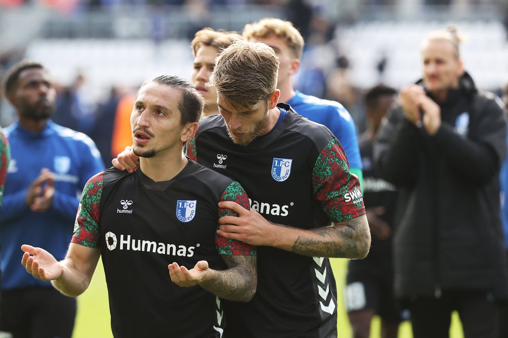 Baris Atik und Marcus Mathisen nach dem 0:0 zwischen dem 1. FC Magdeburg und dem SV Darmstadt.