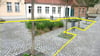 Jella Schnirch und Erik Peretzke haben in Havelberg etliche städtische Flächen ausgemacht, wo das Abpflastern möglich wäre. So wie hier am Platz des Friedens vor den historischen Handwerkerbuden unweit vom Dom. 