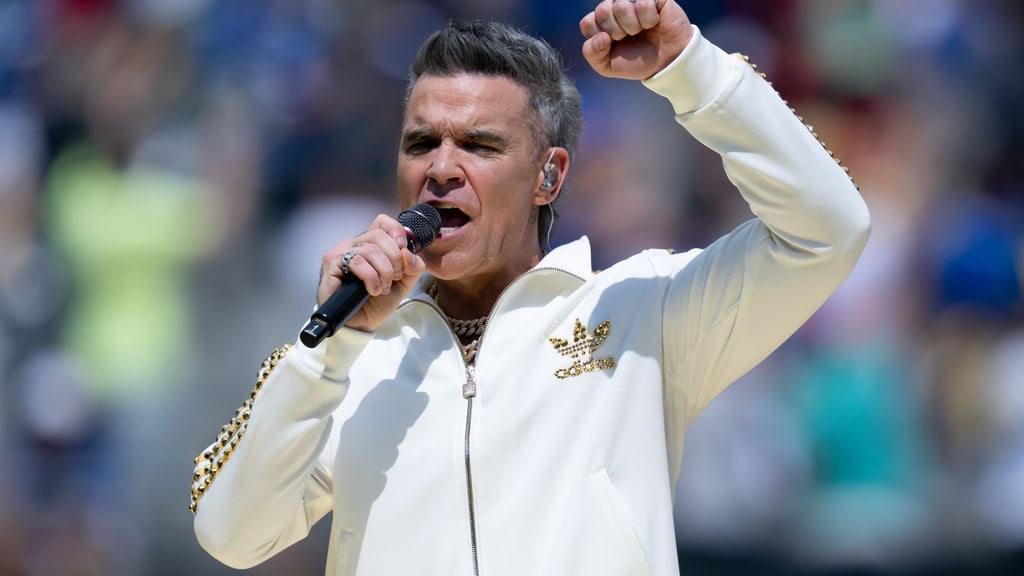 Sein einziges Deutschlandkonzert führt Robbie Williams 2026 nach Düsseldorf. (Archivbild)
