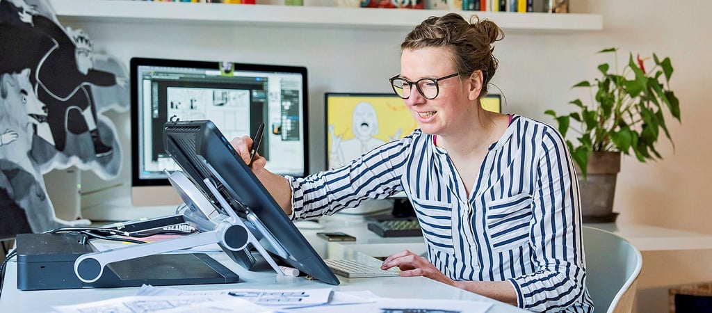 Lucie Göpfert hat  in Wittenberg einen Bauzaun mit einem Luther-Comic verziert.