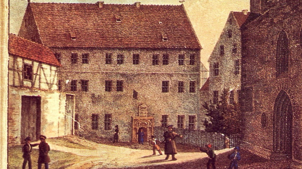 Diese Lithografie von Karl Friedrich Giebelhausen von 1833 zeigt den ersten Standort des Gymnasiums am Andreaskirchplatz. 