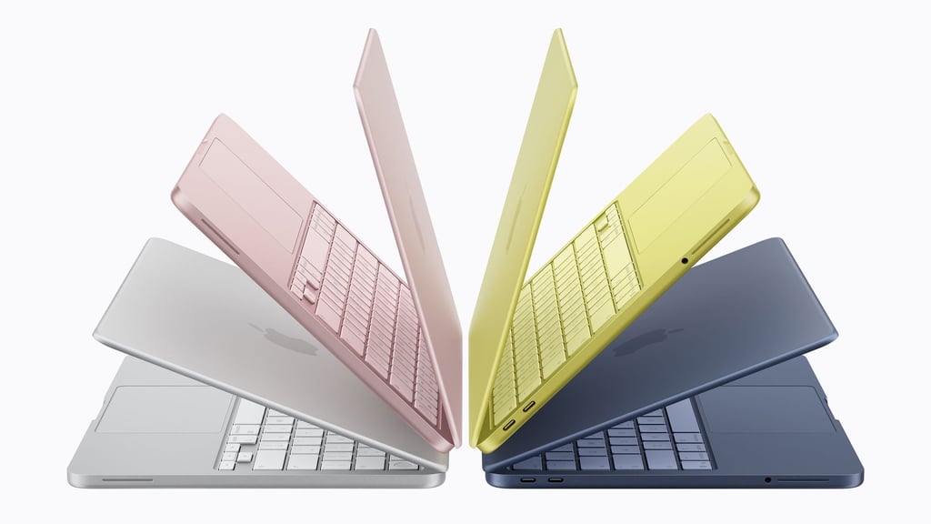 Viermal MacBook Neo: Den Einsteigerlaptop von Apple gibt es in Silber, Rosa, Zitronengelb und einem Blauton.