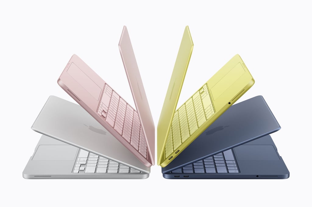 Viermal MacBook Neo: Den Einsteigerlaptop von Apple gibt es in Silber, Rosa, Zitronengelb und einem Blauton.