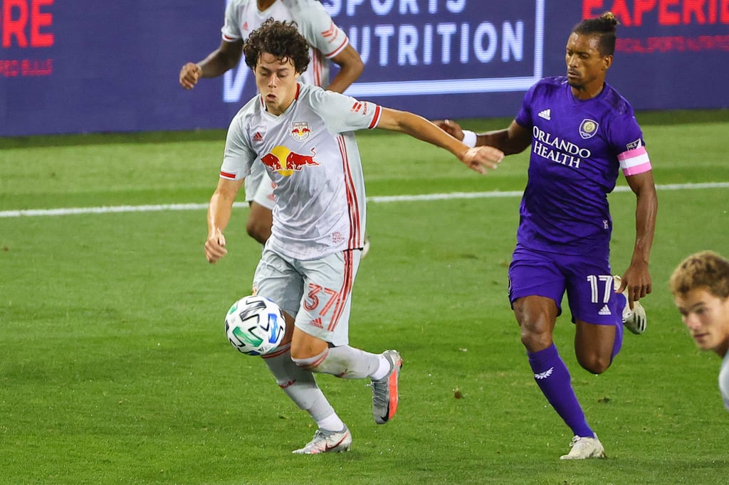 Caden Clark controls the ball for New York Red Bulls.
