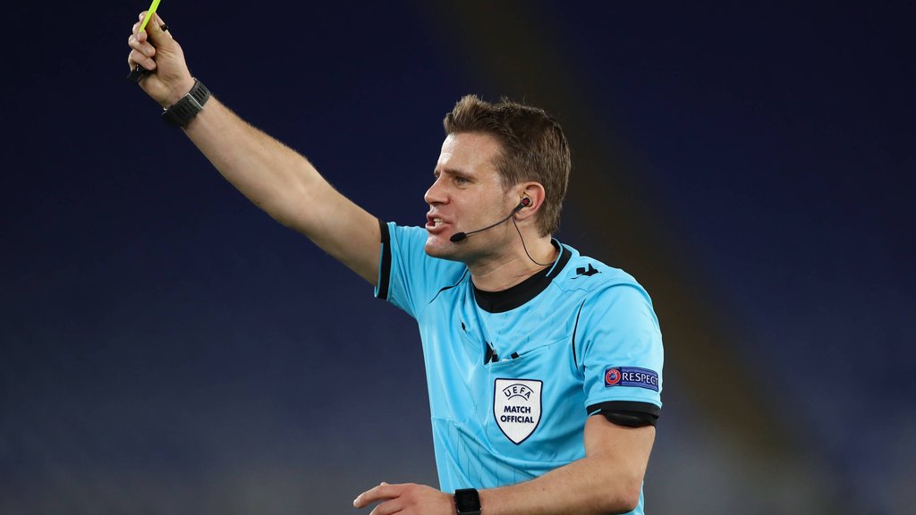 Rome, Italy, 6th May 2021. The referee Felix Brych of Germany takes out his yellow card during the UEFA Europa League ma