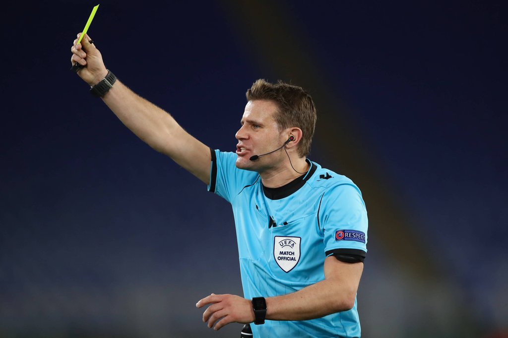 Rome, Italy, 6th May 2021. The referee Felix Brych of Germany takes out his yellow card during the UEFA Europa League ma