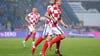 Andrej Kramaric (vorne) und sein Teamkollege Josko Gvardiol (RB Leipzig) freuen sich bei der kroatischen Nationalmannschaft über ein Tor.